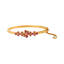 18KT GOLD AND RUBY BRACELET WITH FLORAL MOTIFS